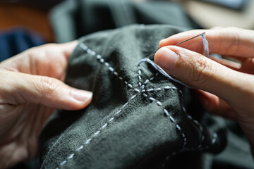 Mending clothes with Sashiko, a traditional Japanese embroidery and stitching technique