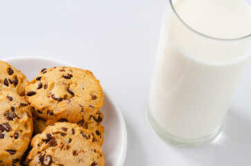 International Cookie Day. World Diabetes Day. National Real Sugar Day. World Heart Day. Breakfast with cookies and milk on the table