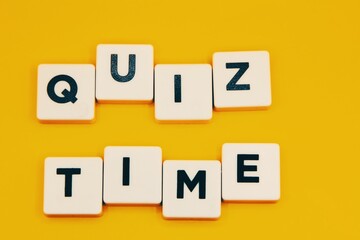 Quiz time on white blocks with a yellow background.