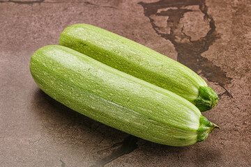 Raw green ripe zucchini vegetable