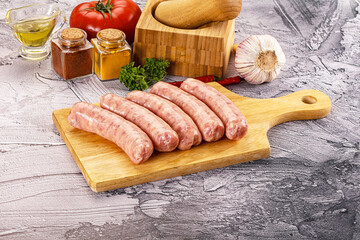 Raw meat sausages for grill