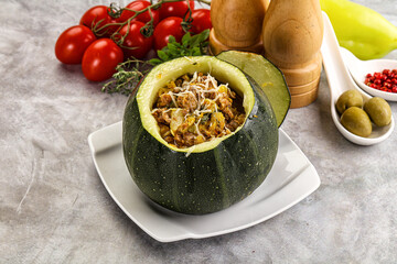 Baked round zucchini with meat
