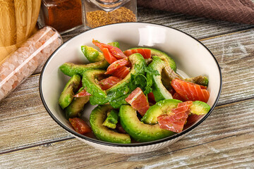 Salad with avocado and salmon