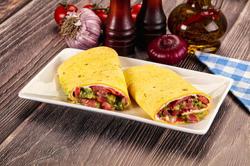 Burrito with tuna and vegetables wrap
