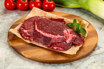 Raw beef cheeks cut for cooking