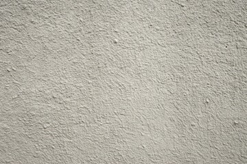 High-Resolution Texture of a Light Gray Rough Plaster Wall Surface Ideal for Backgrounds and Design Projects