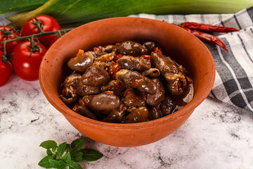 Baked chicken hearts with vegetables