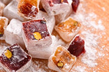 Sweet food Turkish delight, assorted rahat locum in form of cubes with nuts and powdered sugar, traditional food