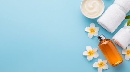 A bottle of body lotion next to a white towel and a bowl of cream