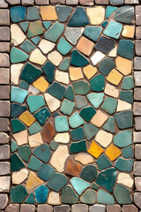 A stunning mosaic of natural stones in earthy and oceanic hues.