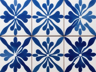 Fototapeta premium Decorative ceramic tiles with intricate blue floral patterns arranged in a geometric design for modern interiors