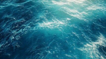 Fototapeta premium Stunning view of the tropical ocean, with turquoise waters and gentle waves. A bright and sunny summer wallpaper that captures the beauty of the seaside.