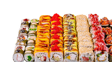 Variety of colorful sushi rolls arranged on a white background