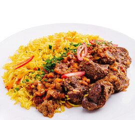 Savory beef and rice dish garnished with vegetables and herbs