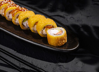 Exquisite mango sushi roll on elegant plate