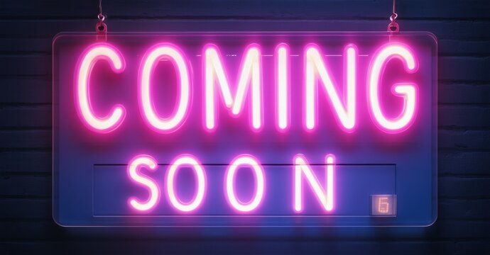 Coming Soon neon sign glowing in pink and blue, mounted on a dark background with bold capital letters, creating anticipation and excitement for upcoming movies, events, or releases