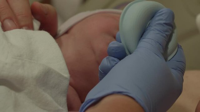 New Born Baby Getting Noese Suctioned