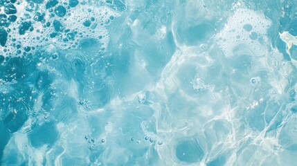Obraz premium Transparent blue clear water surface texture with ripples, splashes and bubbles. Abstract summer banner background Water waves in sunlight with copy space Cosmetic moisturizer micellar toner emulsion
