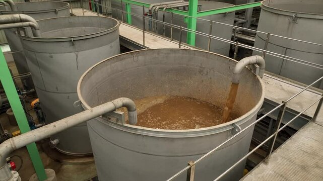 Oil Palm EFB Pulp Processing: Pulp in Tanks at Industrial Facility