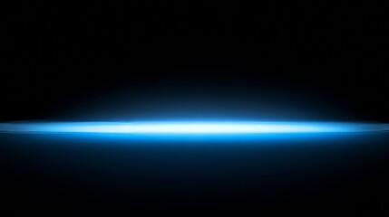 Shimmering blue light against a dark background. Defocused blue light fading into white. Perfect for presentations or abstract artwork.