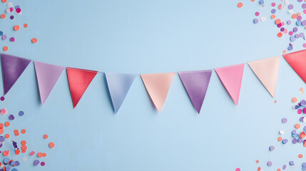 Obraz premium Festive Banner with Multicolored Triangular Flags on a Blue Surface