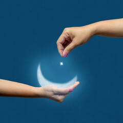 A human hand showing a crescent moon and star in the night scene background. Concept of Religion,...