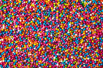 Colorful tiny candy sprinkles background