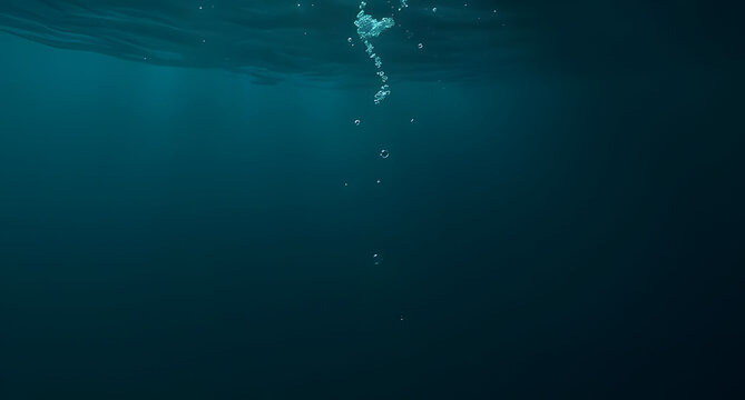 Underwater deep ocean background. Dark teal and deep blue hues. Floating bubbles, light refraction, gentle waves