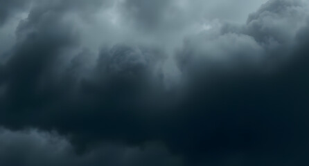 Fototapeta premium Dramatic heavy storm cloud dark gray charcoal navy blue abstract background. Rain fog atmospheric moody texture