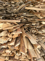 stack of firewood or timber at sawmill warehouse storage