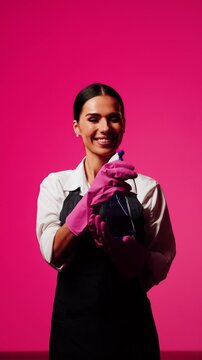 Professional cleaner smiling in a cheerful environment promoting house cleaning and cleanliness concepts
