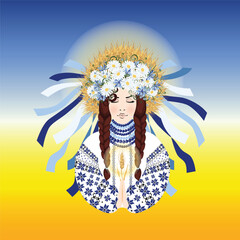 Ukrainian woman prays for harvest in blue embroidery and wreath of wildflowers, daisies, cornflowers, herbs and wheat spikelets