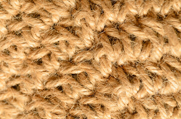 Woven jute fabric texture closeup with natural fibers