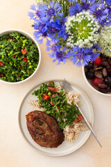 Enjoy a hearty meal with turkey paired with gluten-free pasta and a fresh salad of seasonal vegetables and herbs, complemented by ripe fruits for a balanced and nutritious breakfast or lunch