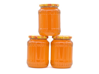 Jars of organic raw polyfloral honey isolated on white