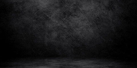 Abstract image of Studio dark room concrete floor texture background with lighting effect.