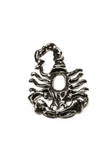 Black figurine of a scorpion on a white background