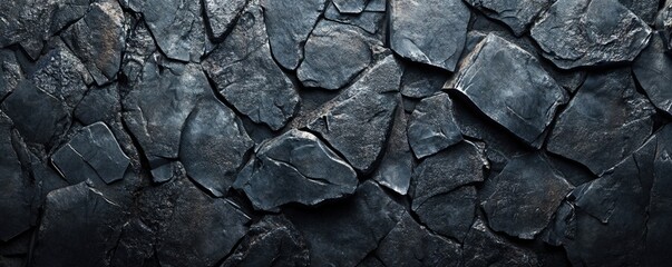 Fototapeta premium Solid dark-colored stone texture.