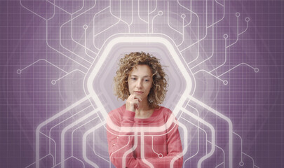 Thoughtful woman with technology graphics. Concept of concern for the future with artificial...