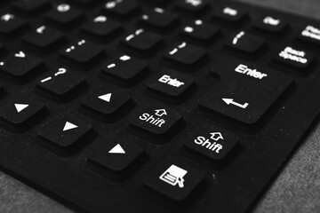 Silicone keyboard keys on a gray background
