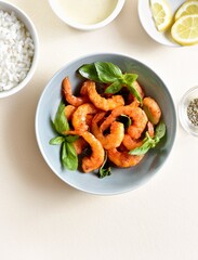Roasted prawn with basil leaves