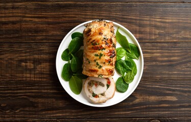 Roasted pork roll stuffed with mushroooms, onion, red bell pepper, spinach