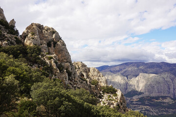 The mountain panorama opening from the hiking path to pick Puig Campana, Finestrat, Benidorm, Spain