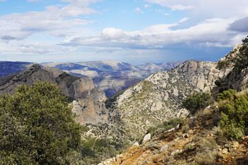 The mountain panorama opening from the hiking path to pick Puig Campana, Finestrat, Benidorm, Spain