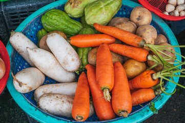 fresh vegetables at the street farmer vegetable market in Asia in Vietnam