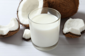 Glass of milk with coconuts on the table