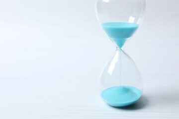 Modern hourglass on white background. Hourglass time concept for business deadline, urgency and...