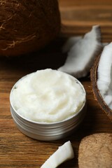 Jar of coconut oil on table