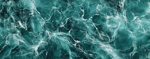 Obraz premium A close-up view of blue water texture, with soft waves and a peaceful flow.