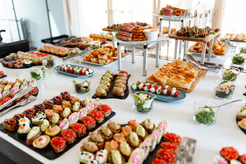 Delicious array of colorful canapes displayed elegantly at a festive buffet for a special gathering